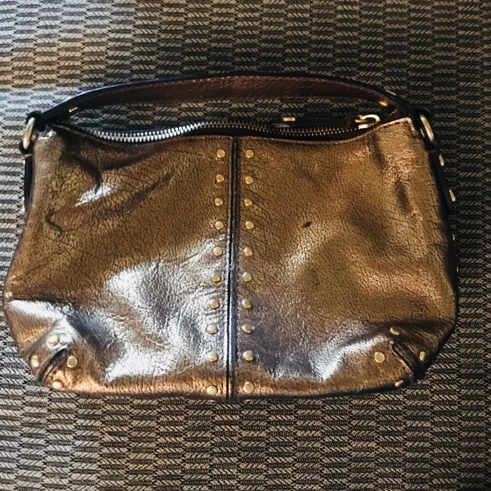 Michael Korda Phil’s purse 👜